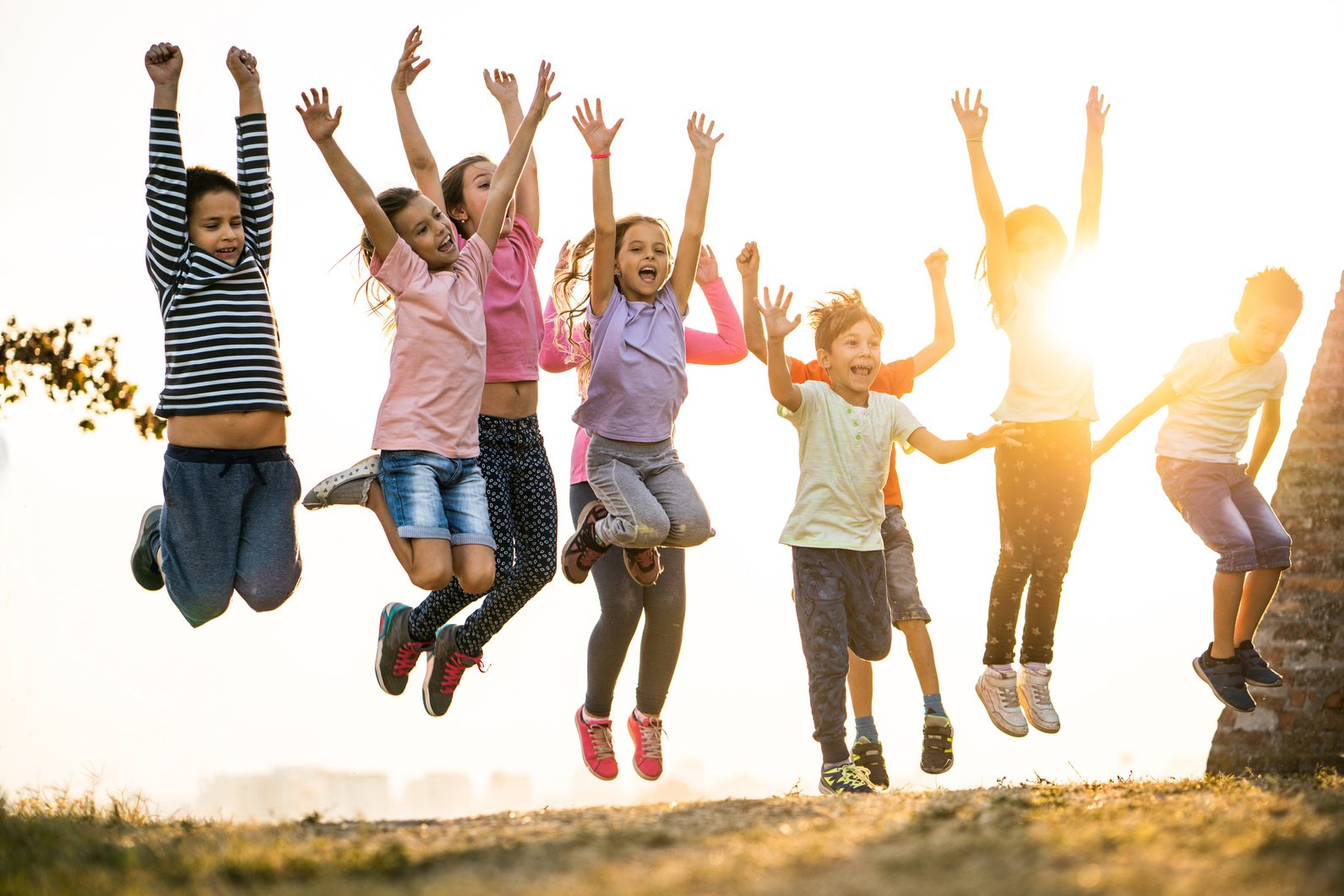 Happy kids jumping